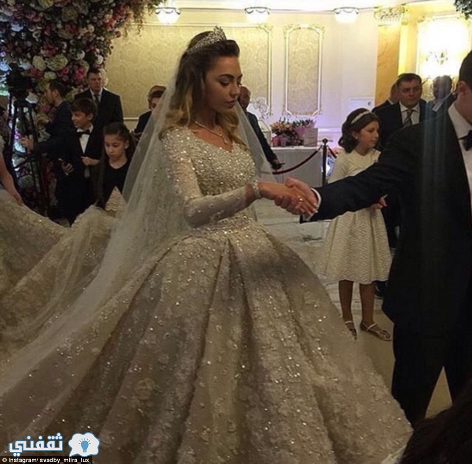 32A7142200000578-3514779-Khadija_s_dress_was_imported_from_Paris_and_reportedly_weighed_2-a-10_1459301110772