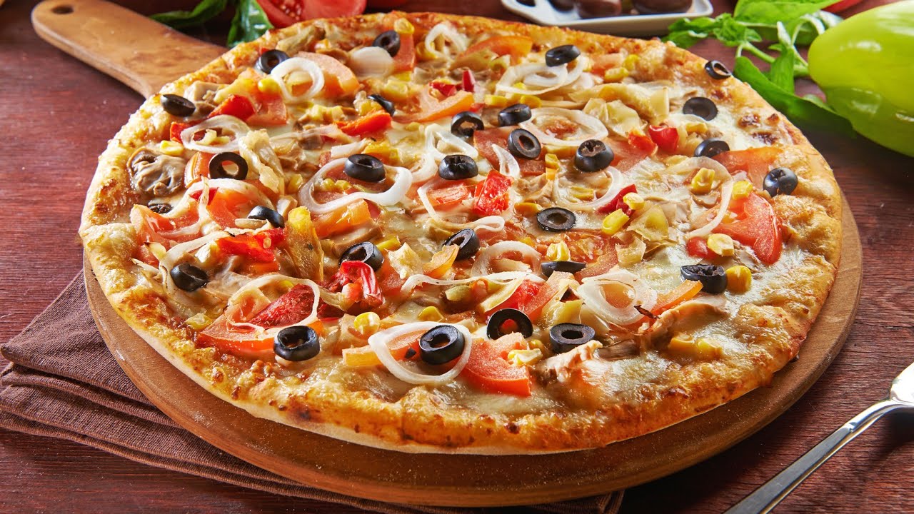 طريقة عمل البيتزا الإيطالية بالفراخ