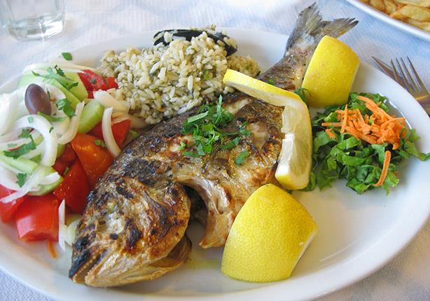 سر تتبيلة السمك المشوي في الفرن والسمك المقلي مثل أشهر مطاعم السمك 