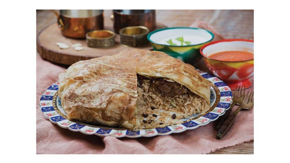 الغوزي الإماراتي بلحم الضأن والأرز من أشهى الأطباق الإماراتية